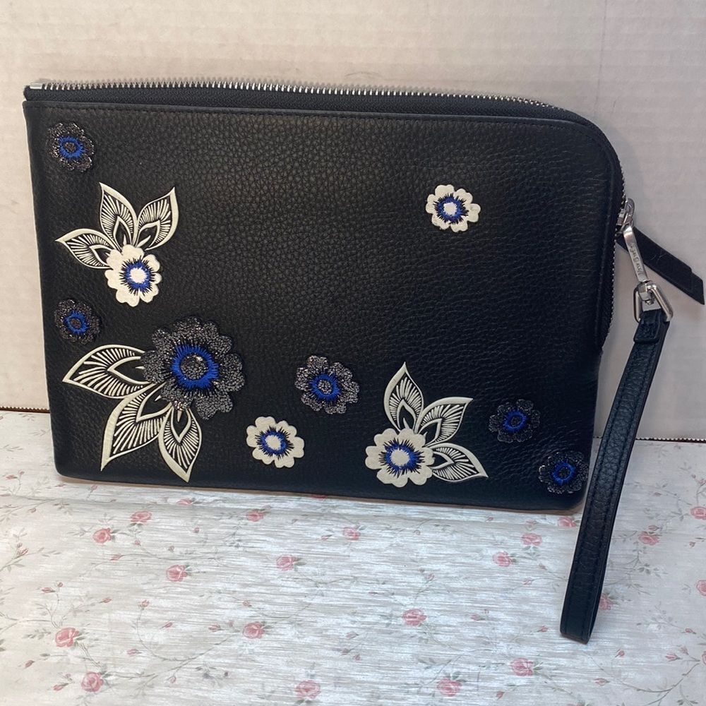 Vera Bradley envelope bag with wrist strap, floral embellishment